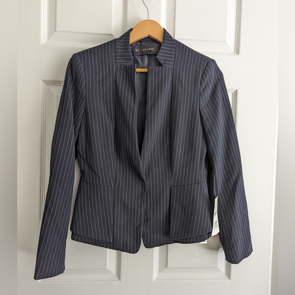 A peplum style blazer. It’s a unique look which I wished I had bought a size up.